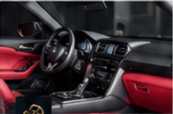 Luxury vehicle interior with red leather
